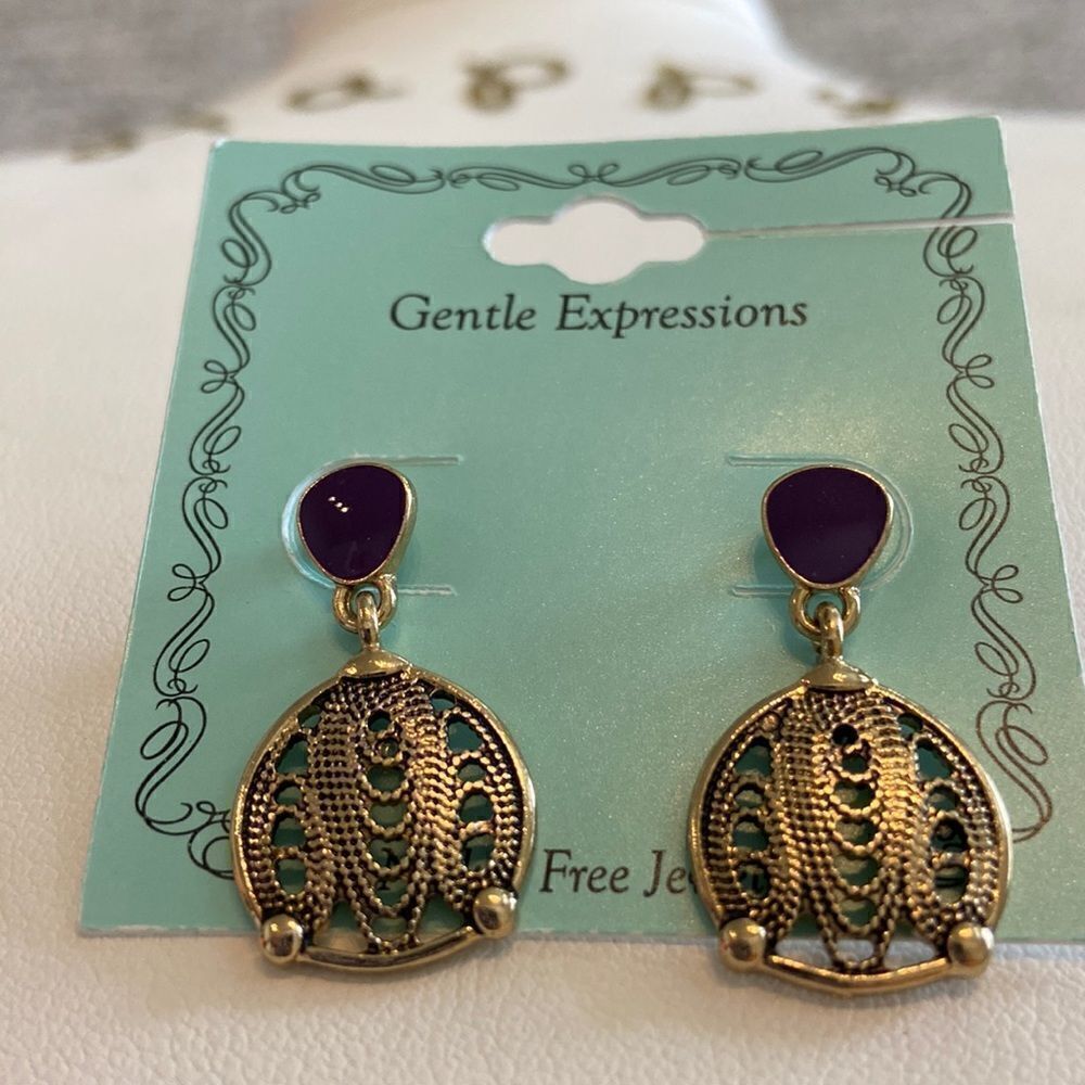 Gentle expression earrings old bronze and purple stone color NWT